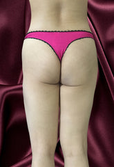 Secret Possessions – Tanga aus rosa Baumwolle mit schwarzem Spitzenbesatz